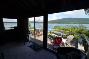 Topside Cottage on Somes Sound View from the living Room over Somes Sound and Acadia National Park mountains.